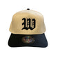 Beige and black cap with a large 'W' logo on a white background
